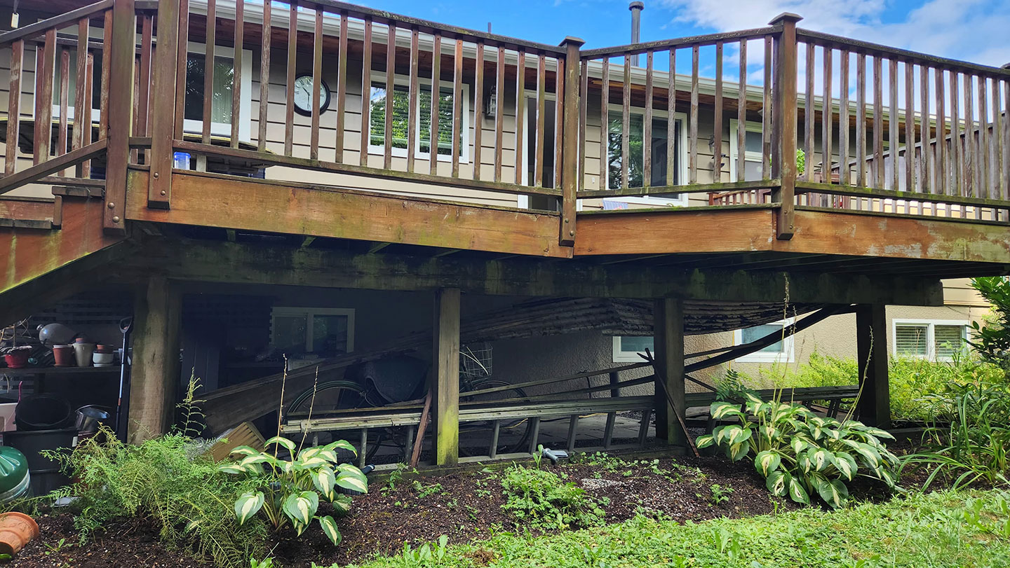 Rotted posts under the backyard deck
