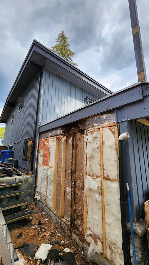 Before deck repair with rotten wood and wet insulation